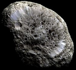 Saturn's Hyperion: A Moon
            with Odd Craters.